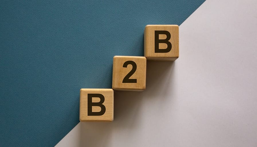 B2B spelled out with wood block letters 